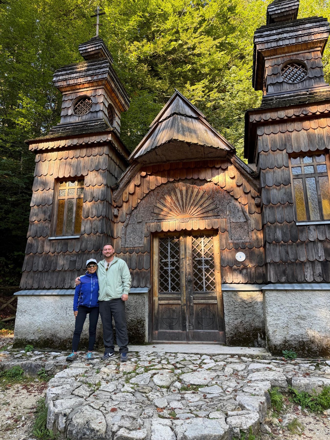 Guests visiting the Russian Chapel below Vršič Pass